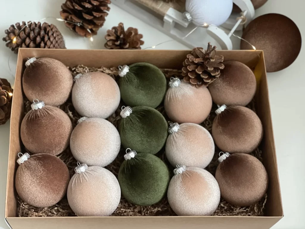 Handmade Velvet Christmas Balls in a neutral color palette in a cardboard box