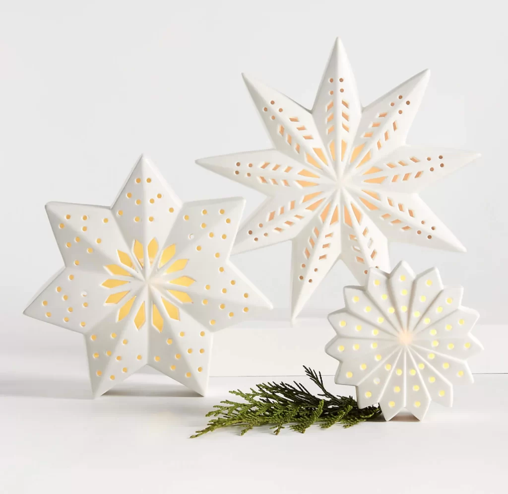 LED White Holiday Ceramic Snowflake from Crate and Barrel on a white background