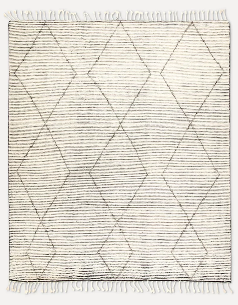 PIERRE RUG in black and white stripes with a lattice overlay